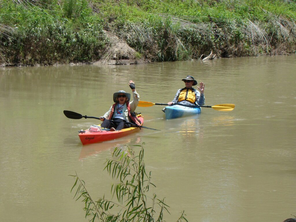 Pair of kayakers on San Antonio river