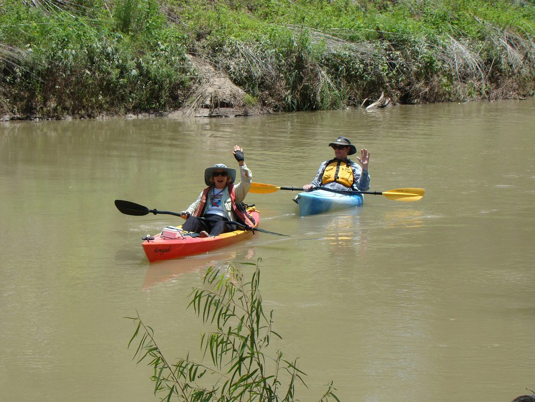 Pair of kayakers on San Antonio river